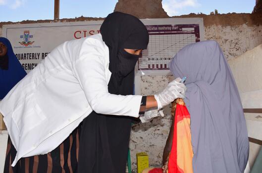 Meet Amina, a nurse working as a vaccinator